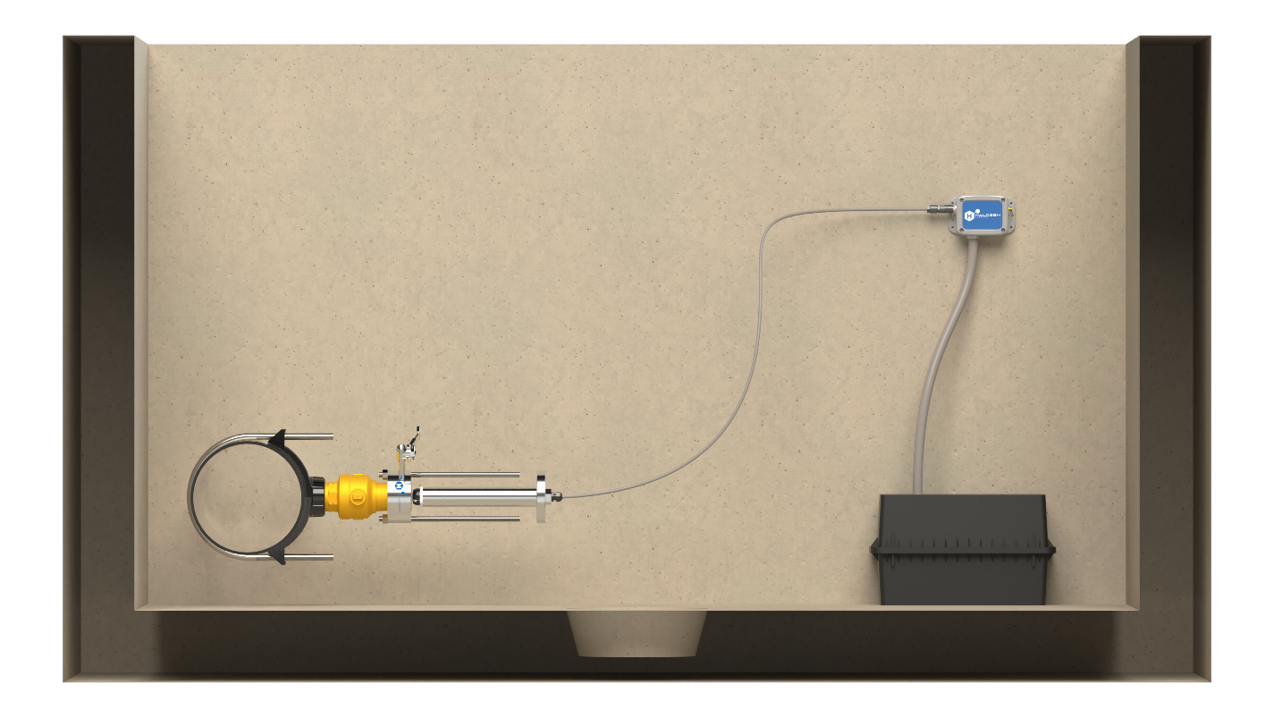 Typical underground vault installation showing wet-tap sensor on pipe, connected to BTSB Smart Box and battery